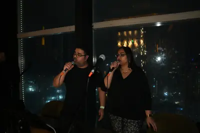 Vocal duet against the Lower Parel skyline